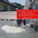 Gudang beras milik LS, terlihat seorang karyawati memasukkan diduga beras oplosan kedalam kemasan. (F/ potensi.news)