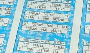Kupon lotto “Lagu Pantun Hadiah” berisi deretan angka acak sebagai nomor undian permainan hiburan berhadiah. (F/Potensi.News/Tim)